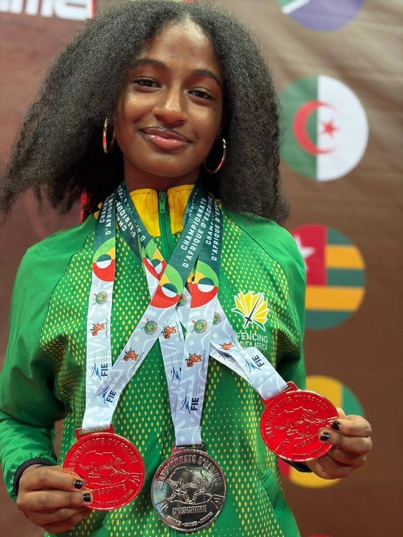 Gianna McIntosh with her three Junior African Championship medals